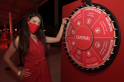Campari hosted an interactive cocktail experience at Italian Bites on the Beach, where guests spun the wheel to determine their designated drink. Rose Gold Collective handled design and production for the Campari booth.