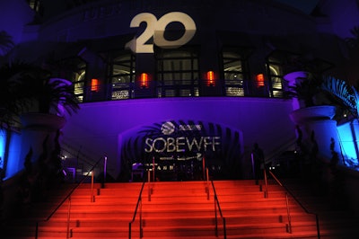 20th-anniversary festival lighting projections dressed the Loews Miami Beach Hotel after dark during the Tribute Dinner.