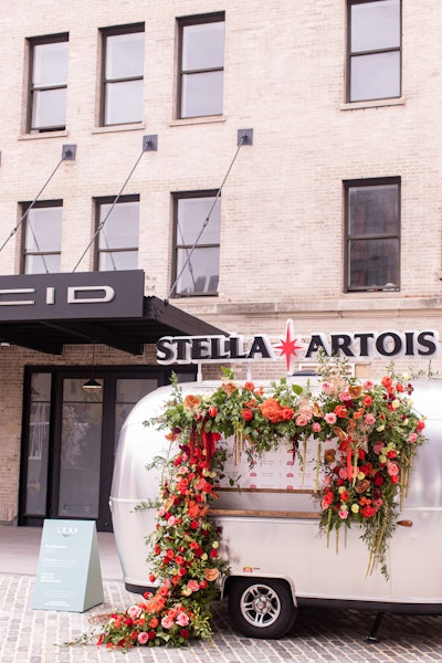 The signature Stella Artois airstream was adorned with shades of red roses by East Olivia, in celebration of Stella’s “Your Table Is Ready” campaign.
