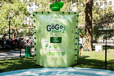 In July 2015, GoGo Squeez promoted its on-the-go applesauce pouches with a custom, interactive vending machine that launched its products into the air. Dubbed the 'Goodness Machine,' the structure resembled the brand's signature snack packet. Kids were invited to catch the flying packets by pushing a button on the machine, which activated a launching mechanism that shot out an applesauce packet from the top. Kids caught the packets, which were attached to parachutes sporting the GoGo Squeez label and activation tour hashtag #CatchtheGoGo. The activation also incorporated a social media and video element, with a custom video recorder that recorded kids interacting with the machine. See more: See How a Brand Took Its Flying Snacks on Tour