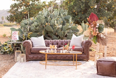 Event specialists Joy n Company gave an outdoor desert space in Southern California an at-home feel with lounging furniture by local company Signature Party Rentals.