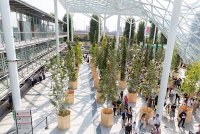 A forest of greenery welcomed visitors to the East Gate turnstiles at the fairgrounds. After the show, the trees were replanted in downtown Milan.