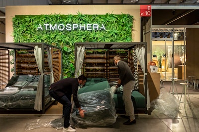 Exhibitor booths used fewer support structures and were replaced with display walls that were hung with products, allowing for air circulation.