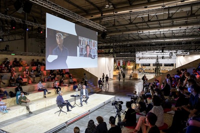 The arenas for the Open Talks programming were made with recycled materials that were recycled at the end of the show. The seat cushions were placed at 6-foot intervals to spread out attendees.