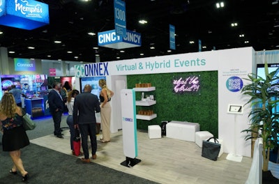 Adjacent to the BizBash stage where hybrid event magic was happening, virtual venue platform 6Connex boasted a tech-forward booth with a cheeky, attention-grabbing neon sign that read 'What the hybrid?' to draw in attendees.