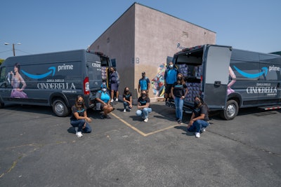 Via Cinderella-wrapped Amazon vehicles, the students received theme boxes filled with new athletic shoes and school supplies.