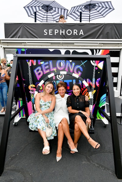 What's an experiential pop-up without an Instagram moment? The event included plenty, including this swing with artwork that read 'We Belong to Something Beautiful' behind it.