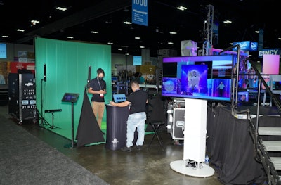 Right next to the BizBash stage, South Beach Photo Booth Co. had guests strutting their stuff on a treadmill catwalk in front of a green screen. Peek to the right and you'll see the runway brought to life digitally.