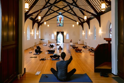 Tutera’s husband and co-host Joey Toth led a yoga class inside Kay Chapel.