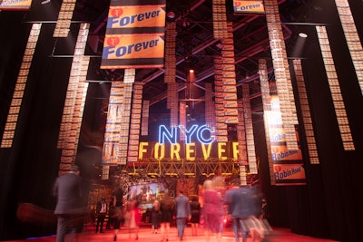 The Robin Hood Benefit, held at New York’s Javits Center on Oct. 20, raised $77.5 million and served as a “love letter” to New York, according to longtime event designer David Stark. As a main focal point, large letters spelling out the word “forever” were actually made from candles that sat on scaffolding shelves—but attendees perceived them as upright because of their reflection in the mirrors above them. A sign spelling “NYC” hung above the display, so “when you walked down the entry hallway into the cocktail space, 'NYC FOREVER' read as one powerful statement,” explained Stark.