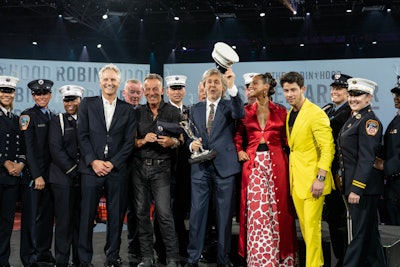 The event featured a concert by Jonas Brothers along with tributes and performances by the likes of Alicia Keys, Bruce Springsteen and Paul McCartney. To further underscore the event’s messaging, the benefit took place on the 20th anniversary of Robin Hood's historic Concert for New York City, which had raised $35 million for the survivors of the Sept. 11, 2001, terrorist attacks.