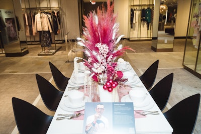 Vibrant shades of pink make the centerpieces pop in Karim Rashid's design.