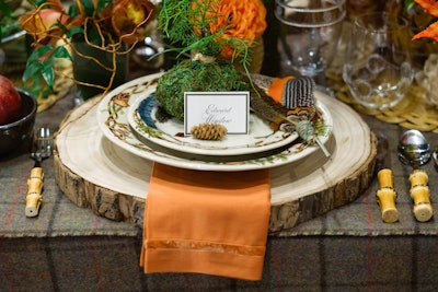 Patterned tableware from Juliska adorns Elaine Griffin's woodsy table settings.