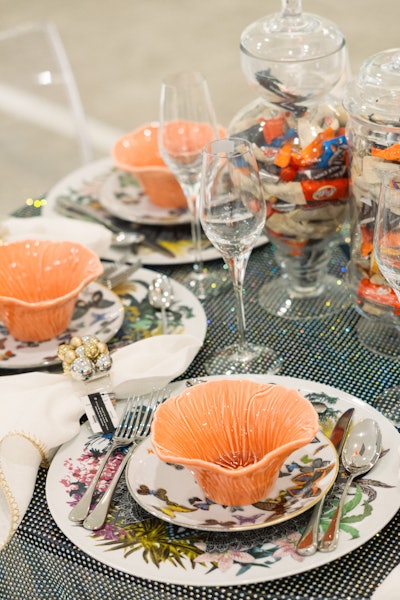 Whimsical porcelain pieces from Vista Alegre decorate the tabletop from LTD x Lizzie Tisch.