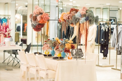 Preserved floral arrangements from East Olivia hover above Daun Curry's tablescape.