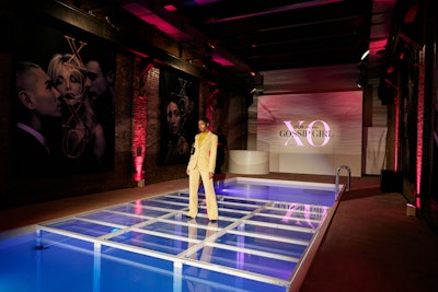 Each room within the five-story townhome used for the three-day event was designed to mimic scenes from the series' reboot, including a pool scene involving characters Aki Menzies and Max Wolfe. A platform was placed in the center of the pool for the perfect photo op as the show's signature 'XOXO' slogan lined the space's brick walls.