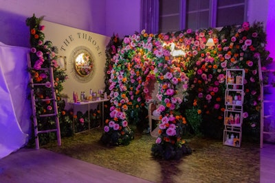 EDEN BodyWorks, which distributes nature-inspired hair and body products, created a floral-clad photo backdrop for attendees alongside a slew of their top-selling products.
