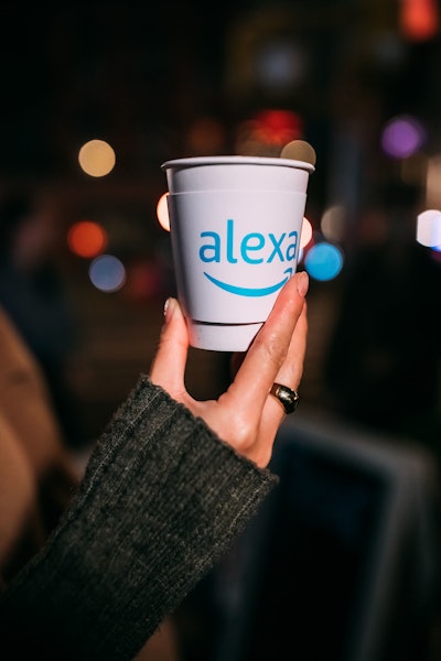For the grand opening of the activation on Dec. 2, guests were treated to freshly brewed coffee with branded sleeves. “We’ve enjoyed bringing ‘Alexa in a Pear Tree’ to New Yorkers so much that we are planning to make it an annual tradition,' said Michelle Scully, consumer public relations lead at Amazon.