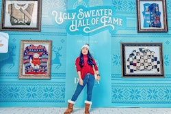 Another space, the 'Ugly Sweater Hall of Fame,' is a 40-foot gallery wall with framed ugly holiday sweaters. It also includes an oversized frame and selfie station for consumers to capture their own 'ugly' attire.