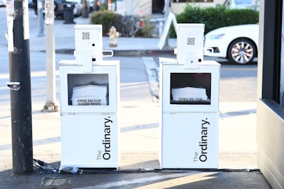 For an added fun touch, newspaper vending boxes were set up beside the stand itself, adorned with additional brand information and QR codes.