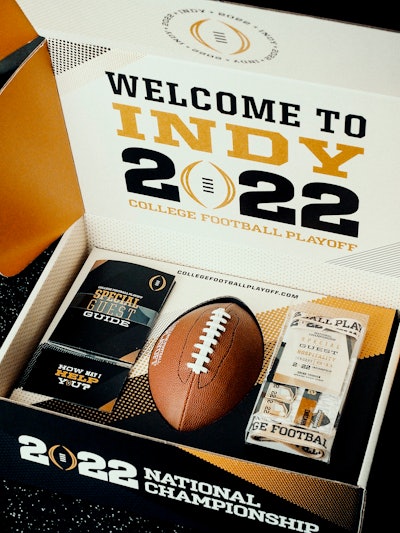 To kick off the event, attendees were handed the branded boxes, which held credentials, passes, guides and a pop-top, along with their personalized football. A removable handle was attached to make it easy to carry.