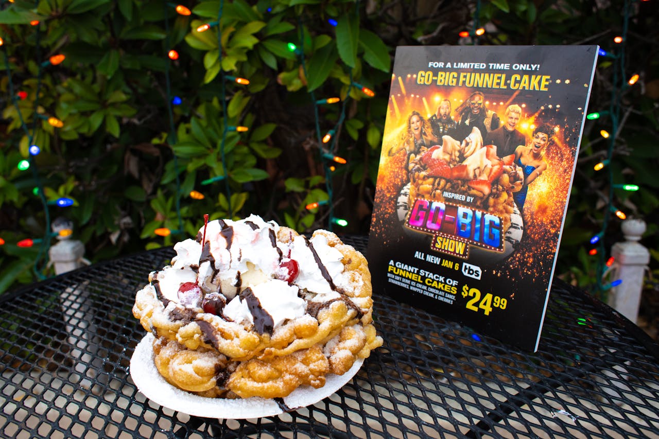 'The funnel cake is not only a staple of theme parks everywhere, but it is a vital part of Six Flags culture. We wanted to take something so quintessentially authentic to Six Flags, to rebrand and expand it as something larger-than-life to align with Go-Big Show themes,' said Lefkovitch.