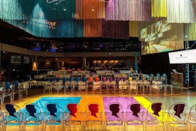 In 2013, Schwarzkopf hosted a runway show in Los Angeles to demonstrate the year’s hair trends to a crowd of industry execs—and since salon pros aren’t afraid to experiment with color, the function quickly took a rainbow-hued spin. The show had a runway in punchy, tropical hues, while a canopy of colored fringe dangled overhead. Surrounding the floor, ghost chairs had bold renditions of the beauty brand's logo. And in plush lounge areas, centerpieces were—what else?—hat heads wearing flamboyantly colored wigs. See more: Hair Show Gets a Dye Job With Colorful Runway and Canopy