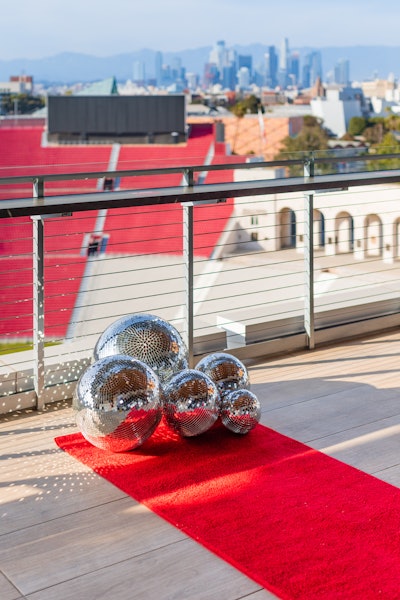 Goodman also recommends creating a “wow” moment when guests enter the party. “Roll out the red carpet if you need to. Have a drink on hand so guests feel immediately welcomed.'