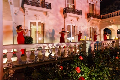 Other nods to Valentine's Day at the Hallmark dinner included an all-female violin ensemble dressed in flowing red evening gowns lining the path to dinner. Along Came Mary handled production and catering, and Kinetic Lighting bathed the venue in softly swirling patterns reminiscent of roses. See more: See a TV Network's Romantic Dinner