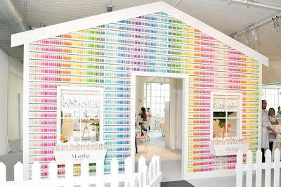 Paint containers—2,710 of them, to be exact—were also used for a 2017 event that celebrated a partnership between Martha Stewart and craft store Michael's. To showcase the versatility of the new products, David Stark Design and Production built a colorful house facade out of bottles of home-decor paint and watercolor-craft paint. Guests were invited to grab paintbrushes from window boxes, then go to work painting everything inside the house—including rugs, couches, lampshades, duvet covers, nightstands and more. See more: See a House Made of 2,710 Bottles of Martha Stewart Paint