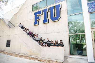 At FIU's Chaplin School of Hospitality and Tourism Management, students are actively participating in workshops and listening to speakers.