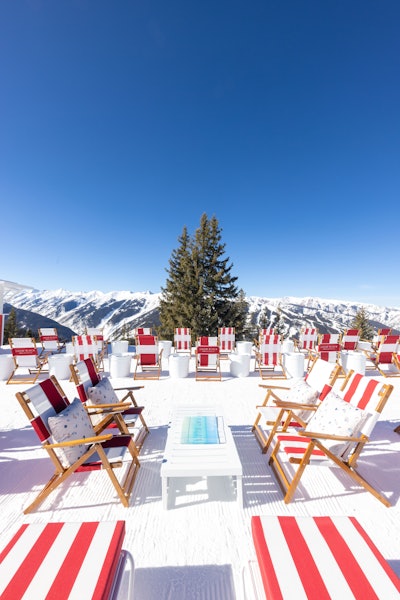 Malin's beach prints are also featured in the bottom of custom acrylic serving trays at each table.