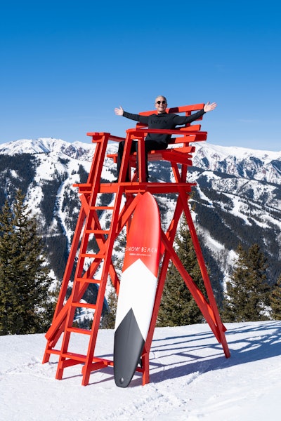 Nods to sun-soaked Miami (and perfect photo-op props) include custom lifeguard chairs and surfboards.