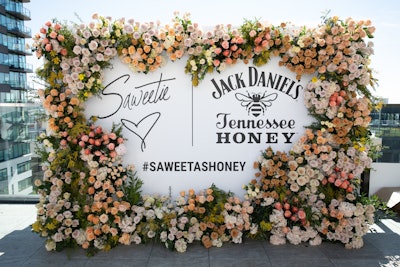 Outside, attendees at the Saweetie and Jack Daniel’s brunch could enjoy floral-filled photo ops and poolside bites and watch the rapper perform her new single.