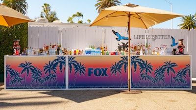For FOX’s brunch, the AKJOHNSTON team also custom-fabricated a bar with the same California-inspired purple and orange gradient that adorned the trailer.