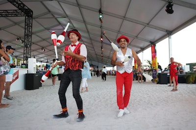 Jugglers entertained guests underneath the North Tent at Bacardi Carnival. Throughout the event, guests played competitive carnival games to win prizes.