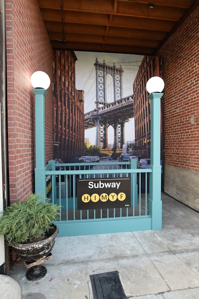In another fun, New York-inspired photo op, guests could pose alongside a replica of the 42nd Street subway entrance. Campfire handled event production.
