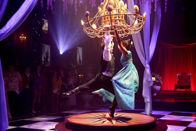 A love story plays out during an acrobatic performance in the ballroom.