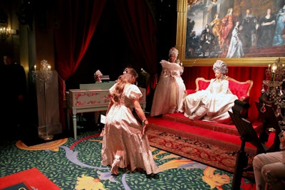 Guests curtsy before Queen Charlotte during “The Queen’s Ball: A Bridgerton Experience.”