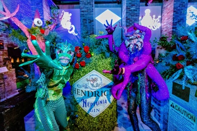 Performers dressed as strange sea creatures entertained guests.