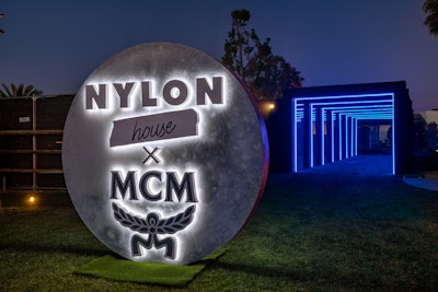 The neon-lined gathering was designed and produced by Event Eleven, while Whalefilm handled fabrication and Pro Systems handled lighting and audio.