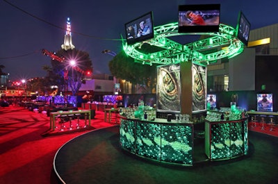 Before “event tech” became a hot-button topic in the industry, when The Amazing Spider-Man premiered in 2012, the “Ultimate Lizard Lounge” bar commanded attention during the after party with LED screens displaying a reptilian skin-looking image as a nod to the film’s villain, Doctor Connors/The Lizard, and a green-lit, 14-foot-tall truss ring surrounded by plasma screens playing clips from the movie. The event shut down LA’s Broxton and Le Conte avenues, with a red carpet under a 16-by-22-foot stylized metal “web,” which hosted The Amazing Spider-Man’s cast earlier in the day and welcomed a star-studded guest list to the after-party, dubbed “Party Under The Web,” when the clock struck 11 p.m. The party took place in a 30,000-square-foot space up the street, and aside from the technology-forward bar, guests took turns with Activision Spider-Man games, including a climbing wall and a photo booth with a movie-inspired backdrop. See more: Guests Climb Wall Like ‘Amazing Spider-Man’ at Premiere Party