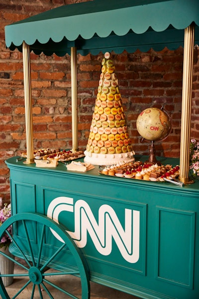 CNN selected food and beverage vendors “who could complement our global feel and give our guests an opportunity to feast on a range of delicacies,” Cook said. Cue a CNN-branded macaron tower from French-based patisserie Ladurée, Peruvian sandwich experts the Peruvian Brothers, Great Britain-inspired eatery Aboveground, and more. “Food vendors were stationed in market booths so guests could choose their own food and beverage experience throughout the event,” Cook explained. And not to be forgotten—the brunch favorites that were passed around hors d'oeuvres style courtesy of Occasions Catering.