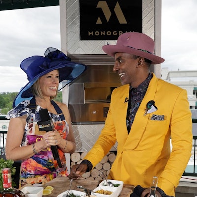 Appliance brand Monogram teamed up with chef Marcus Samuelsson, who created Derby-inspired dishes including bourbon-glazed chicken with peanut succotash on a savory pancake. The sponsored segment aired as part of NBC Sports’ Derby Day coverage on NBC and Peacock. “We were able to create a moment for our guests who could watch the segment on our big board and then also for our guests at home,” Ramage explained, adding that over 3.5 million Derby parties take place around the world on the day of the race.