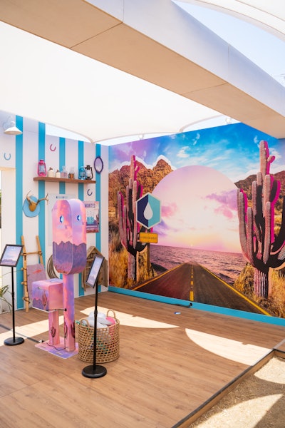 A colorful photobooth tied into the festival’s surrounding desert landscape and country music theme.