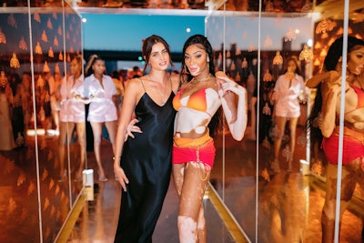 A-listers were in attendance, including models Taylor Hill (left) and Winnie Harlow (right), and PATRÓN served up high-end fare to lean into the luxe vibe. Aside from the playfully named Perfect Pit Stop cocktail, Revved Up Margarita, and Zero RPM mocktail, light bites included bacon-wrapped scallops, skirt steak skewers with red chimichurri, shaved Serrano on toast, and more. The entire event was planned and executed by LA-based creative strategy brand VMG.