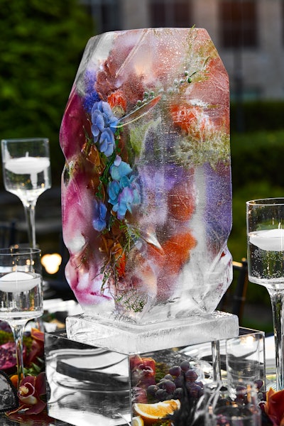 The tablescape featured breathtaking, exotic-looking ice sculptures that encased colorful florals. 'The idea was not to use white flowers but to bring color to the scape,' said Elizabeth Harrison, CEO and co-founder of H&S.