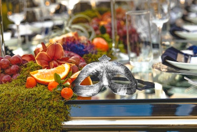 The table design featured other impressive details, including fruit, figs, and moss to lean into the nature-inspired evening. Masquerade masks were also on the table for guests to use at their leisure—a reference to Capote's Black and White Ball. At their place setting, each guest also found a bookmark with their name engraved. And under each plate was a card for a trivia game, where guests recalled fun facts they'd learned about Fairmont's history throughout the night. Clarke said this was one of her favorite moments of the evening. 'We were concerned people might not be interested in the game, but it got very competitive!' she quipped. Prizes included Fairmont-branded custom vinyl records featuring the playlist of the evening—'music is such an important part of the history as well,' Clarke said—and a free stay at one of the Fairmont properties.