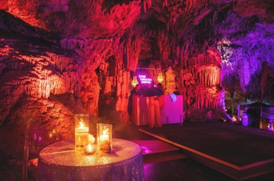 In the summer of 2018, more than 75 influencers, models, and bloggers partied in caves and on yachts for an experiential marketing vacation with Revolve in Bermuda. The fashion retailer ditched its usual summer activation post in the Hamptons that year and looked to local full-service creative event and style production house Dasfete to curate every corner. In one of the most memorable moments, Dasfete transformed Grotto Bay Beach Resort’s cave spa into a nightclub for a #RevolveSummer-themed rendezvous. A DJ booth and dance floor anchored the space with neon signage, mini chandeliers, and candles, setting sexy mood lighting in the cavernous room. See more: Inside Revolve’s Experiential Marketing Vacation for Influencers