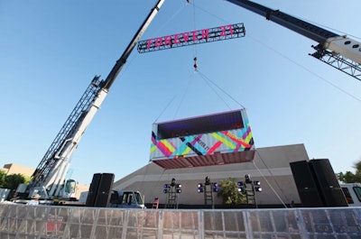 As an annual music festival that’s become known for its curated, Insta-worthy moments, it’s no wonder Coachella was one of the early adopters of dazzling DJ booths. Take Forever 21’s “Party in the Sky” setup. In 2014, the Los Angeles-based fast-fashion retailer brought two enormous cranes to Palm Springs to hoist its brightly colored shipping-container-turned-DJ-booth into the air. In an added branding effort, a truss above was marked with the event host’s name in pink. See more: Coachella Party Pictures: Innovative Ideas From the Biggest Bashes